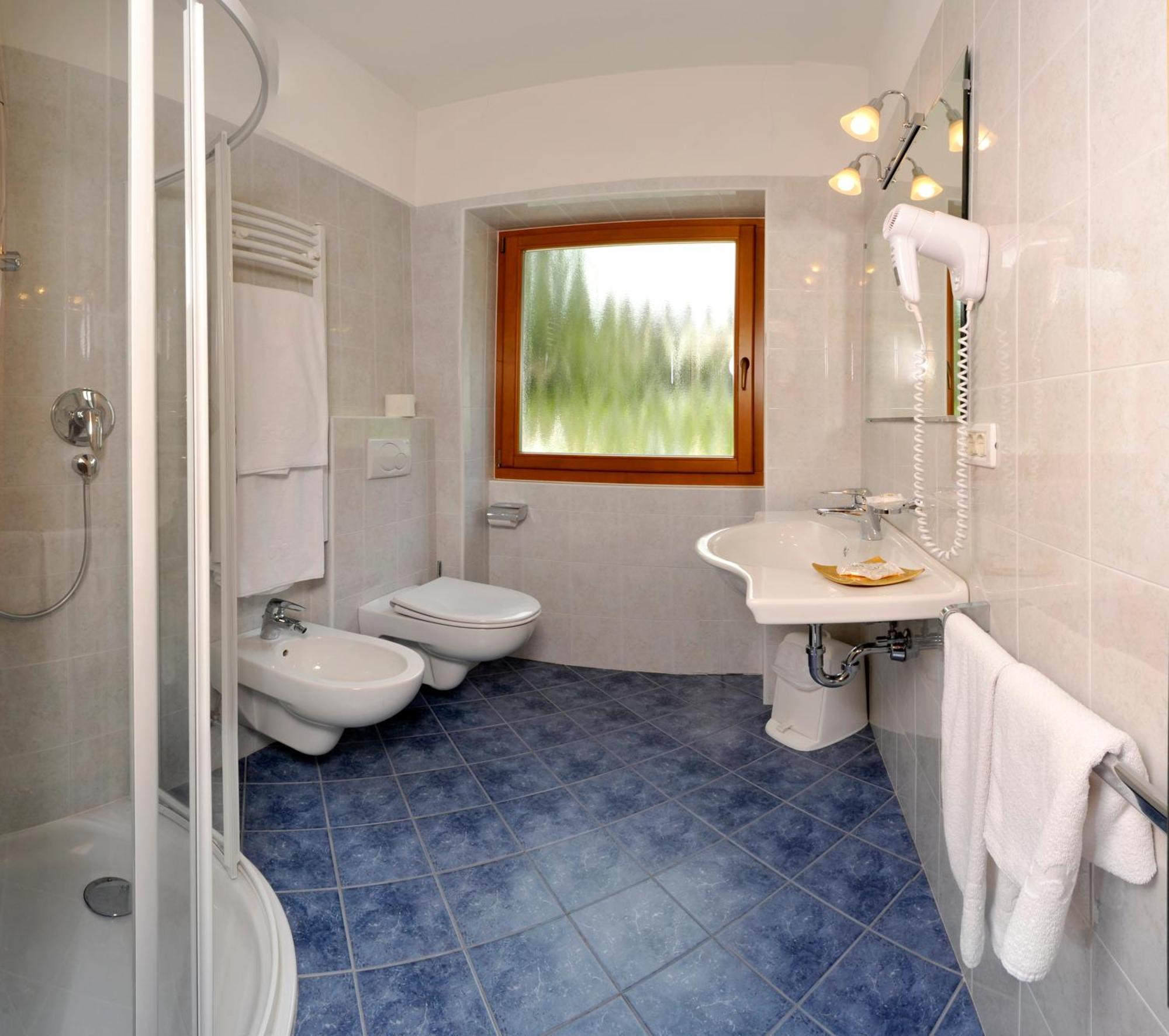 Hotel Europa Dolomites Selva di Val Gardena Bagian luar foto